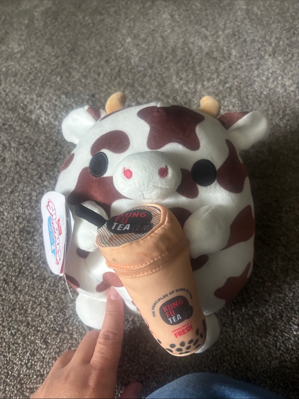 Squishmallows Cow Plush with Brown Spots and Peach Bubble Tea
